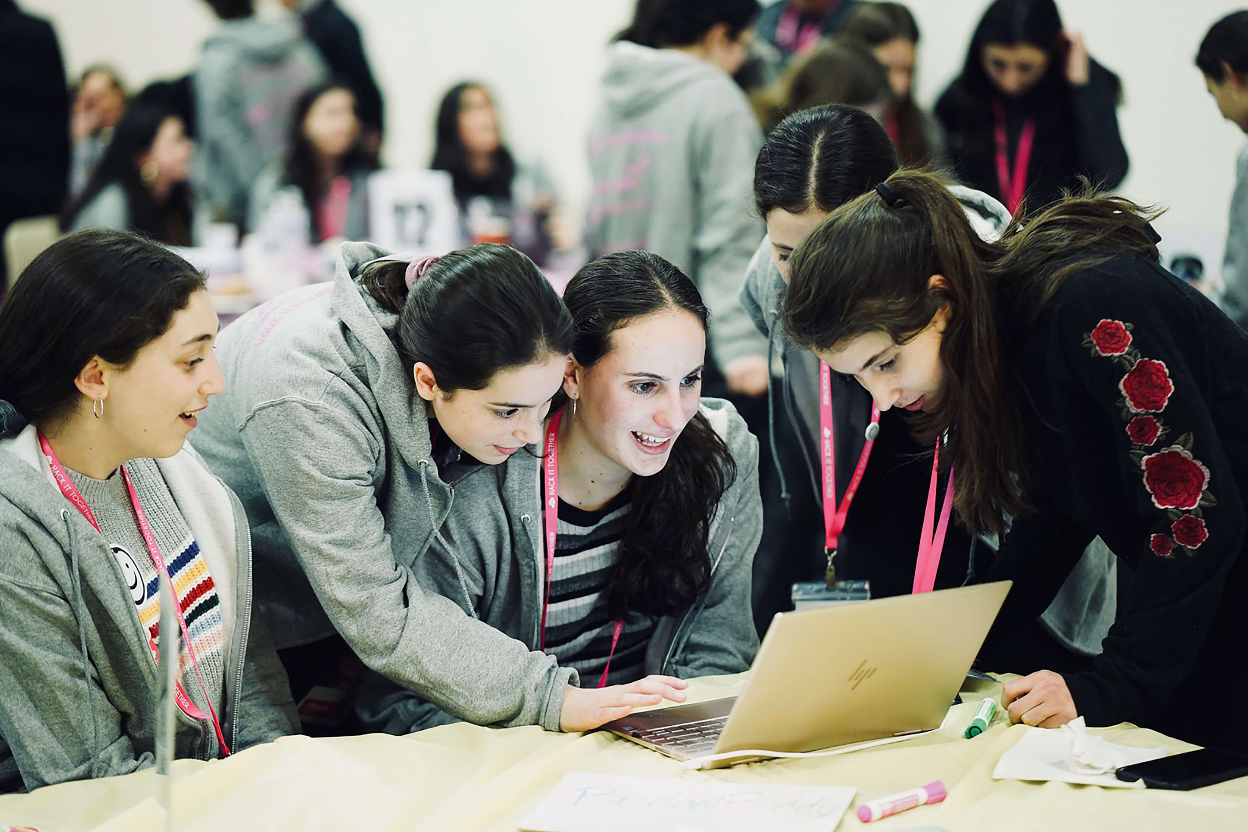 Hackers at LCW's 5th annual hackathon team up to plan their project